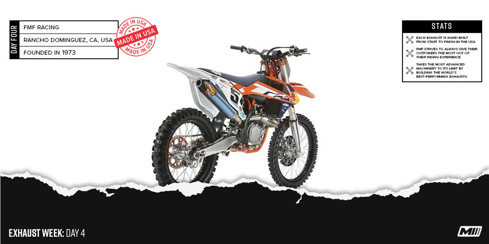 An orange and white KTM motorcycle featuring an FMF Exhaust
