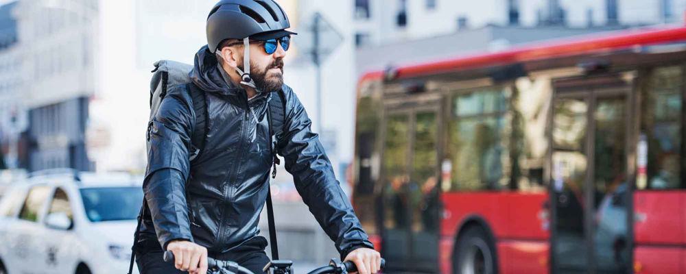 Man riding a bicycle through the city