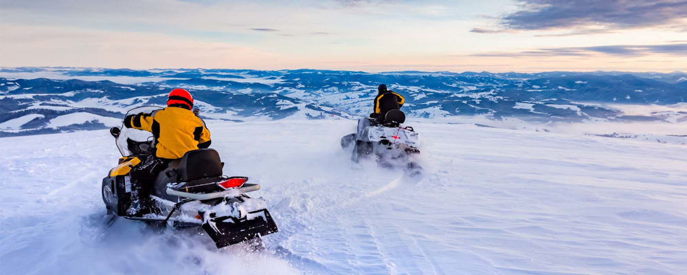 Always ride with a buddy when taking a snowmobile trip!